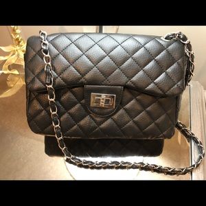 Black quilted bag.